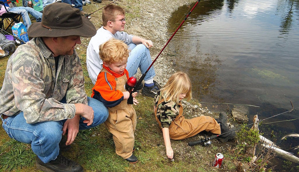 wyatt bailey mans his fishing pole while brother johnny and sister elizabeth 1b3ff0 1024